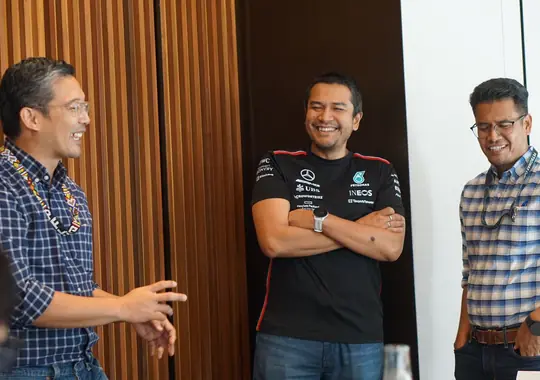 Participants laughing during a coaching discussion